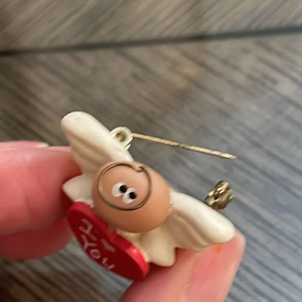 Kirk’s Angel Cheeks Angel Holding a Red Heart “ I ❤️ You”